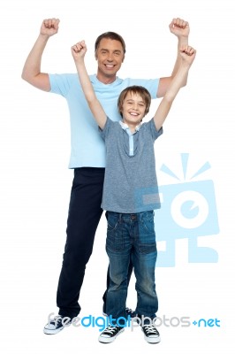 father-and-son-rejoicing-together-100209422